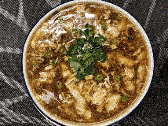Diced fish with mushroom in sour soup